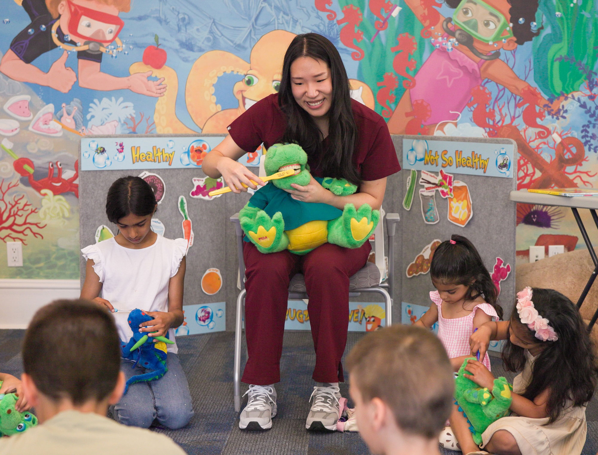 tooth brushing demonstration at heritage house dental